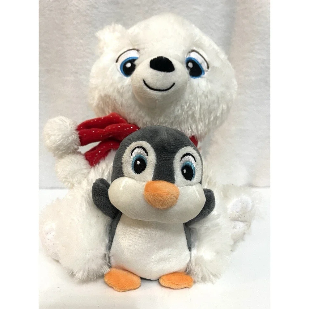 Plush animated Singing Bear holding a Penguin Singing,
